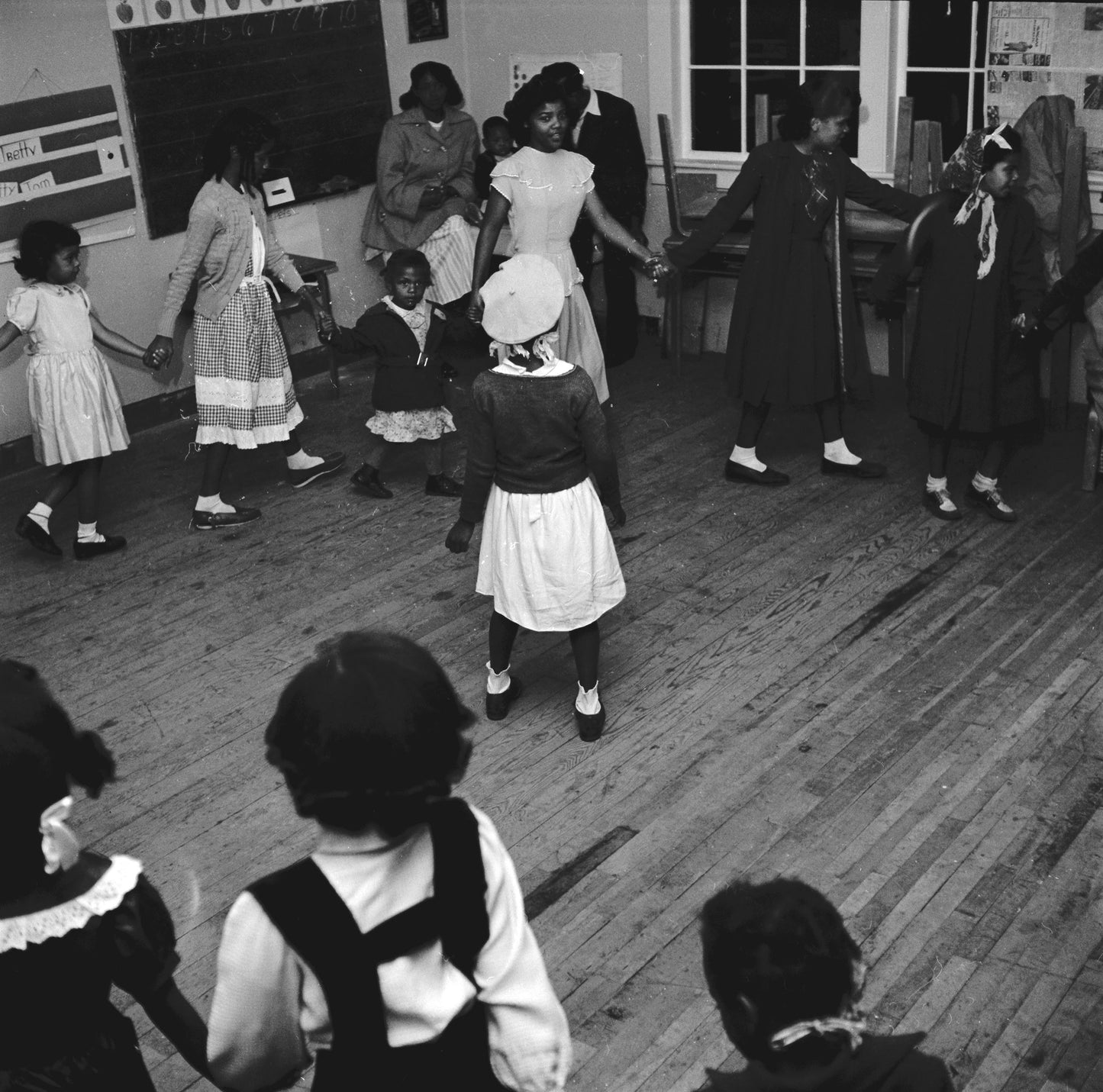 Children dancing after the presentation of the Dent citizenship trophy