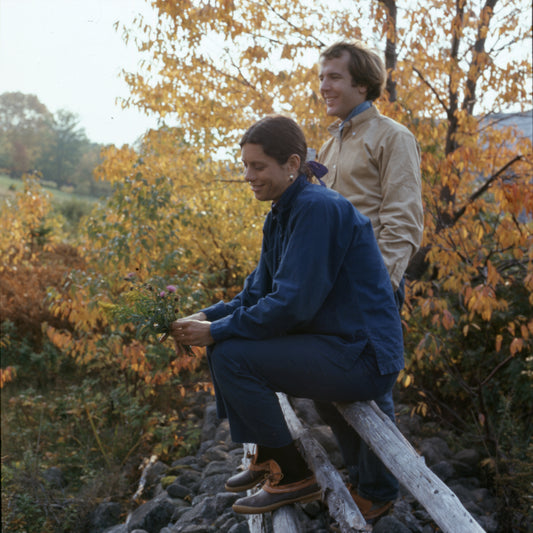 Couple Sitting on Fence
