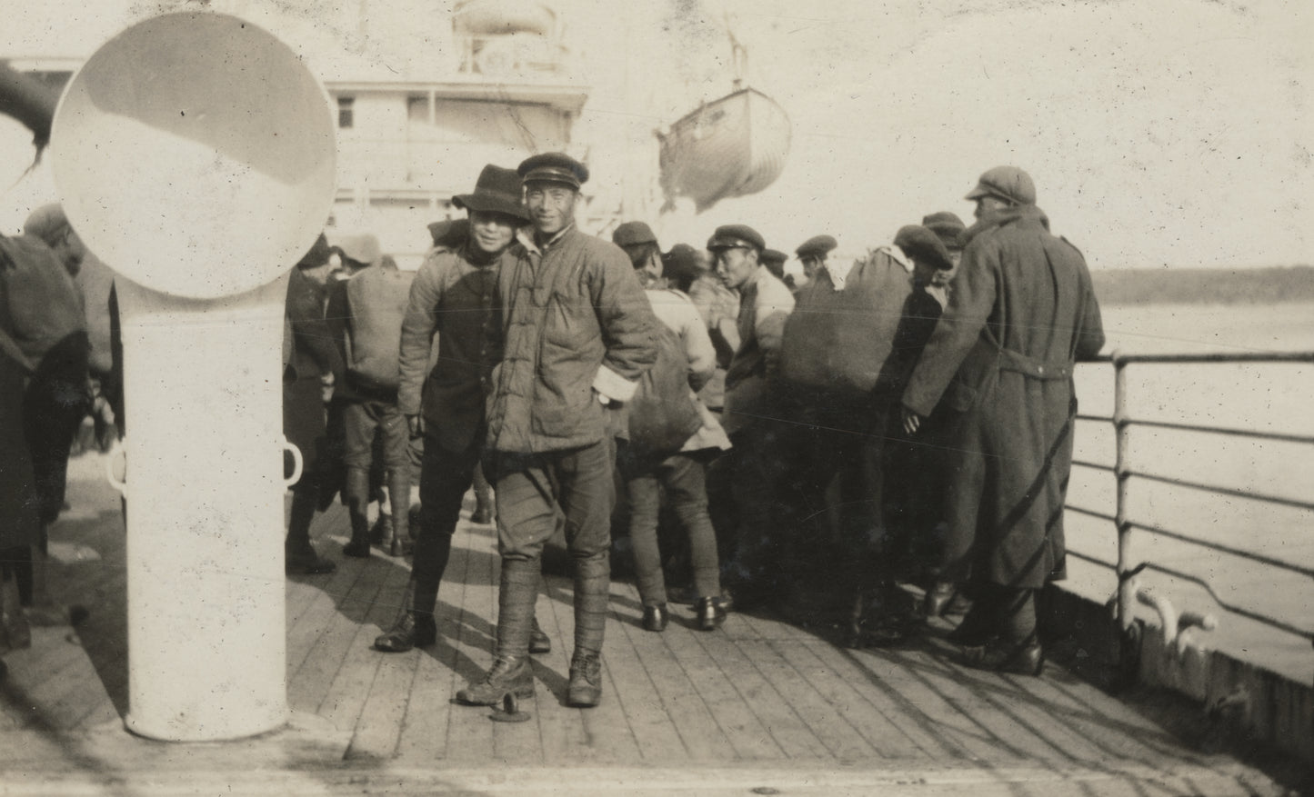 Chinese men returning from overseas, Pier 2