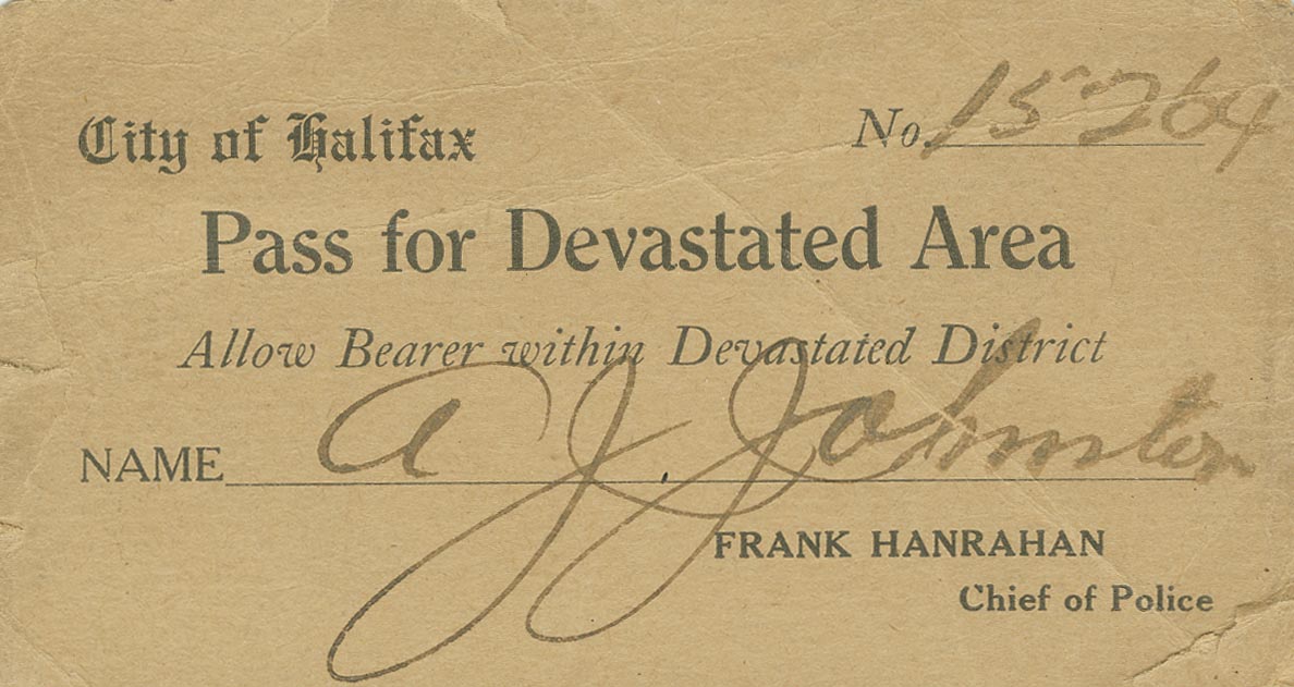 Pass for Devastated Area, number 15264, issued to A. J. Johnston.