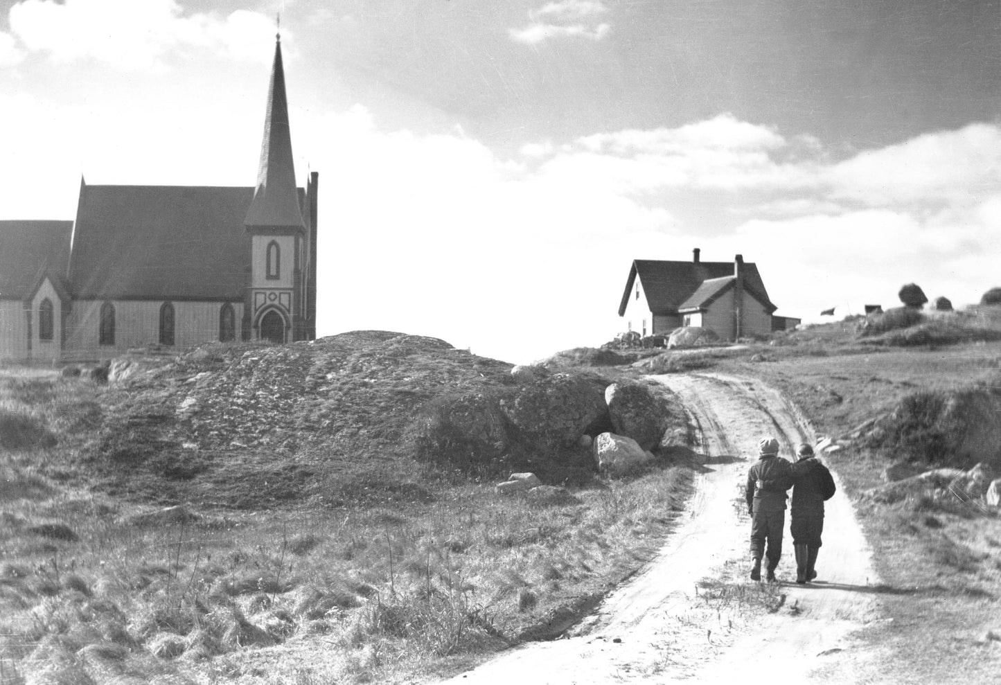 "Children walking up road past church, Peggy's Cove"