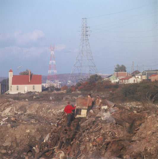 Halifax city dump with Seaview African United Baptist Church and Africville houses in the background
