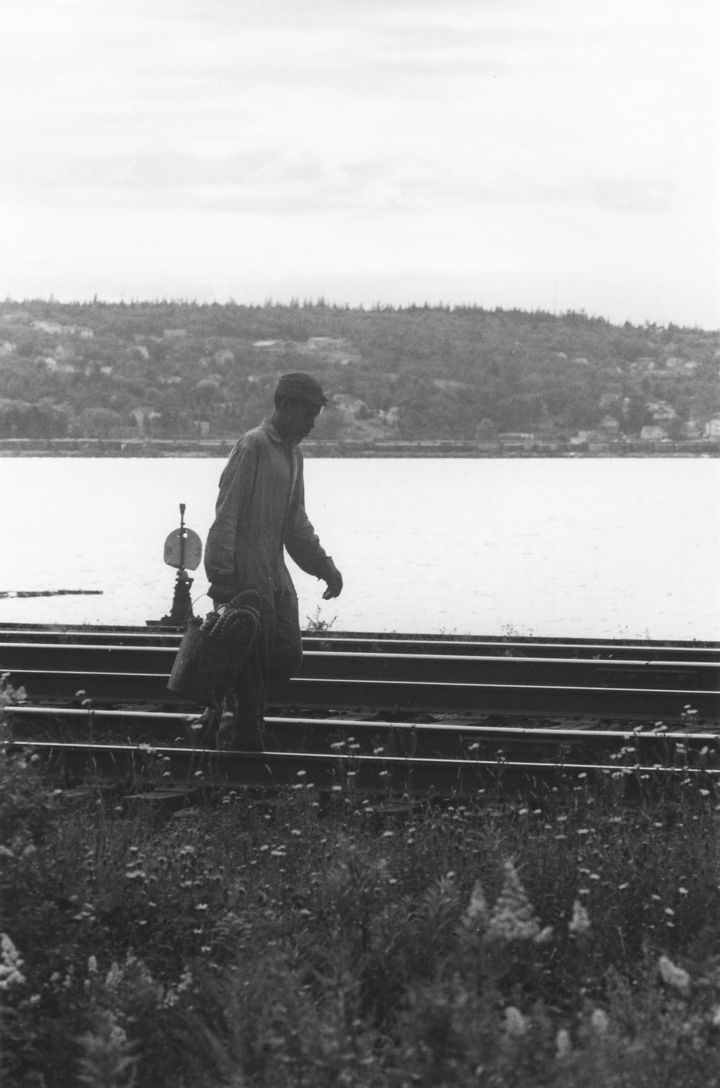 Lone walker by the railroad tracks, Africville