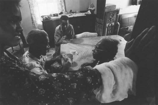 View of discussion at dining room table, Africville