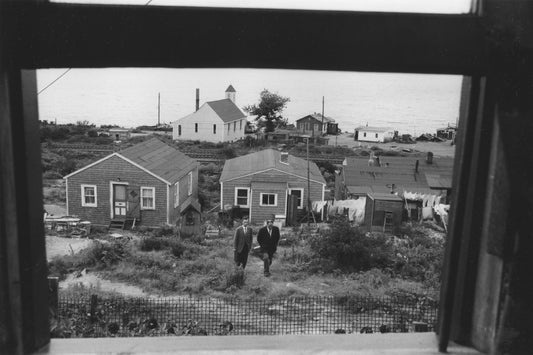 Two Halifax city officials walking up an Africville path