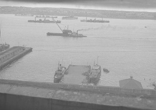 Dutch passenger ship PKQ36, freighters and tug W.J. Harahan pushing Halcrane north