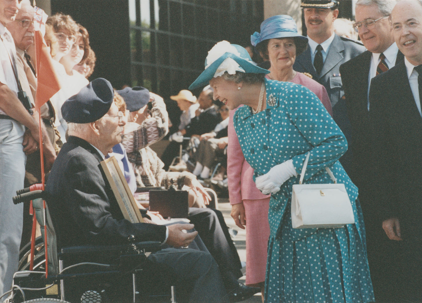 Queen Elizabeth greeting a veteran