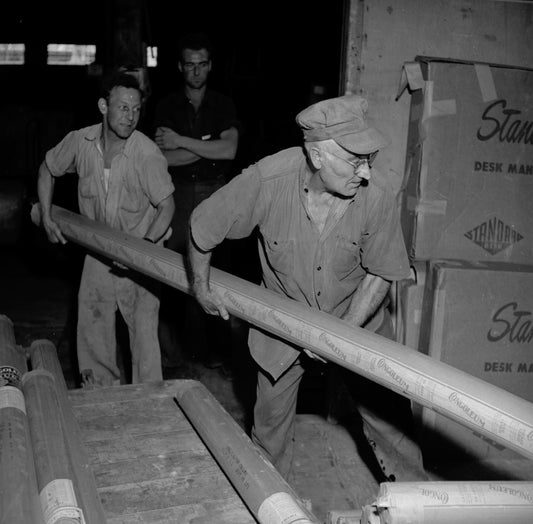 Loading a freight car at the Canadian Pacific Railway freight shed
