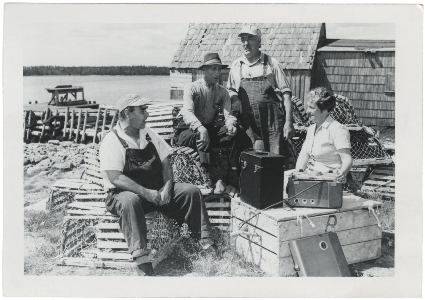 Helen Creighton recording Mr. Grace Clergy, Freeman Young, Bernard Young at Petpeswick