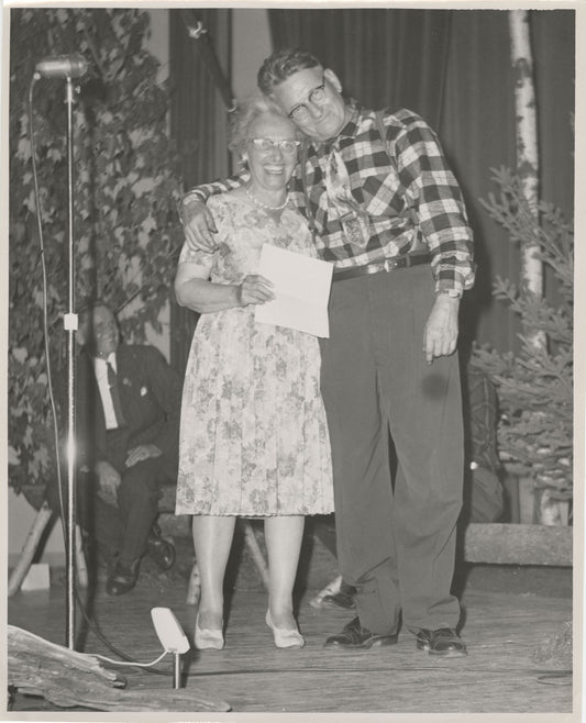 Wilmot MacDonald, with judge Helen Creighton at end of Miramichi Folk Song Festival. Sam Jegoe seated